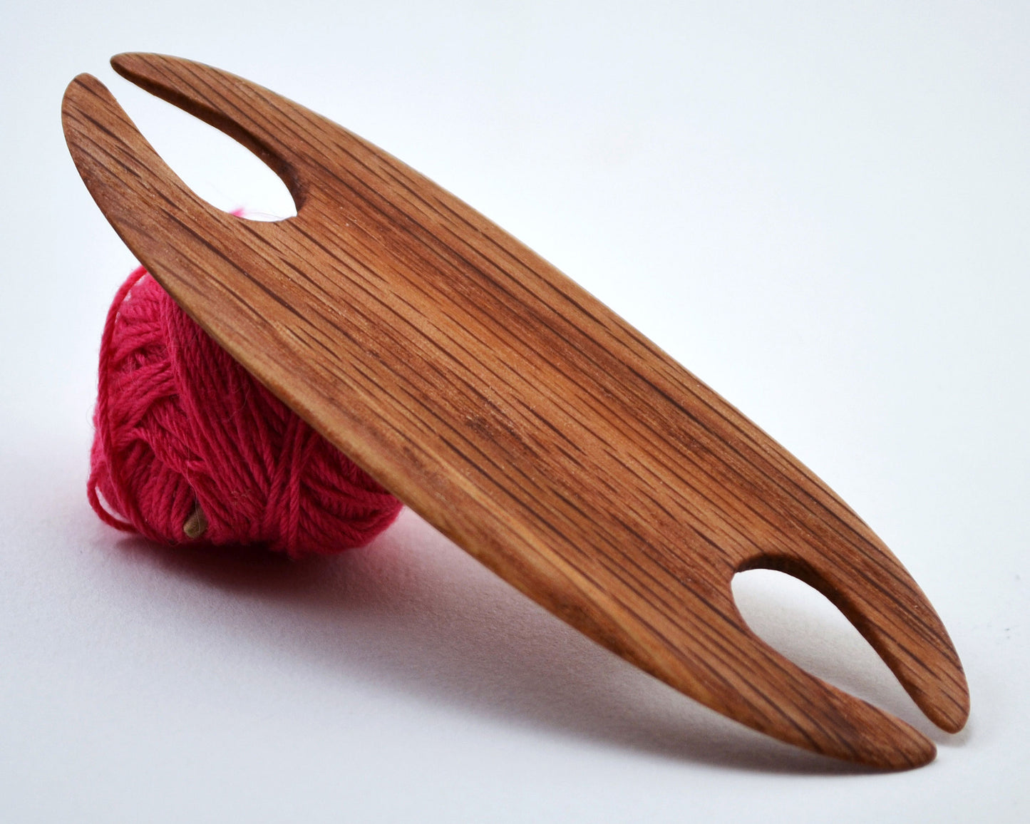 Small weaving shuttle. Handcrafted from red oak by Wiener Dog Ranch. View 2.