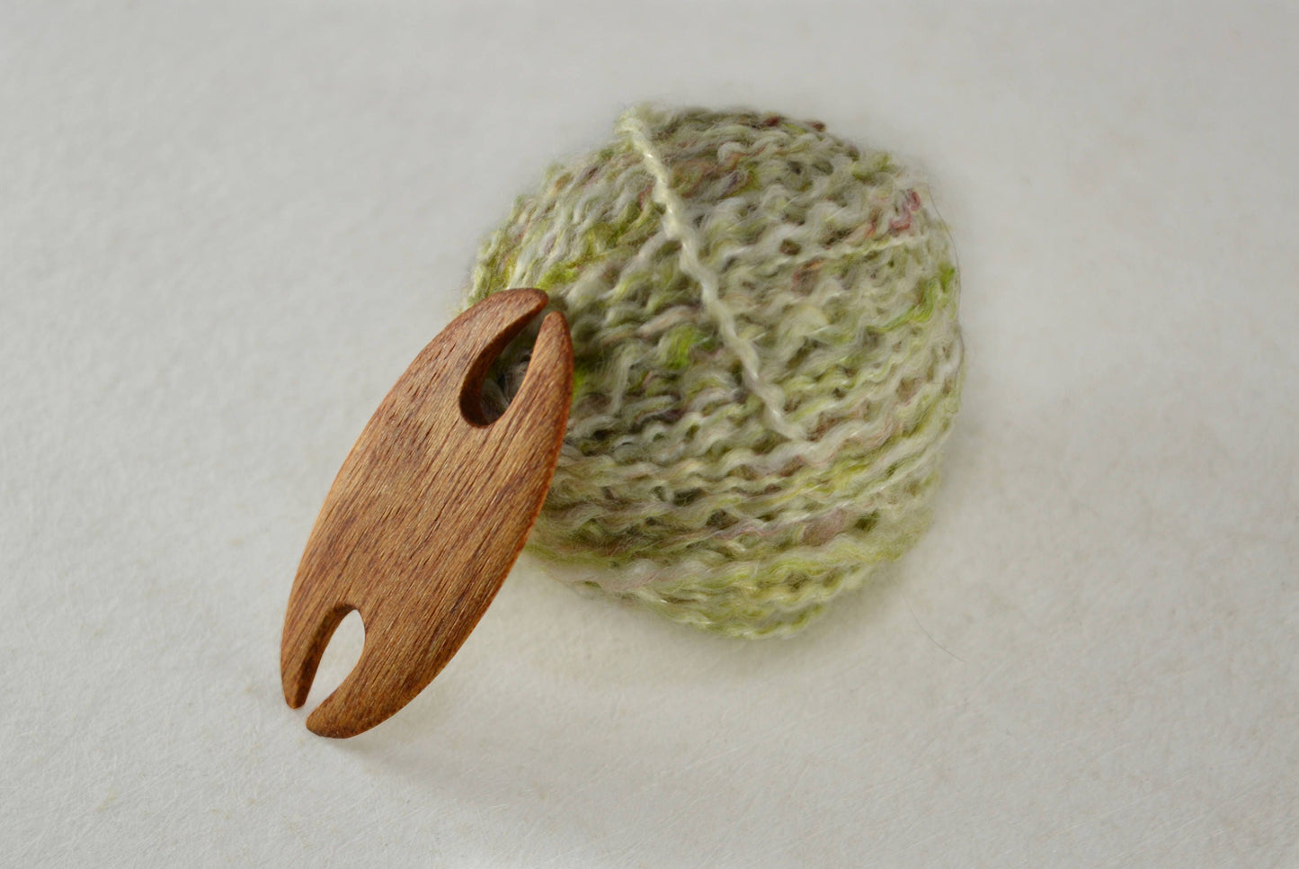 2 inch weaving, tatting, or lacemaking shuttle. Handcrafted from mahogany by Wiener Dog Ranch. View 2.