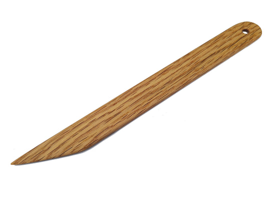 8 inch point turner and seam creaser. Handcrafted from red oak by Wiener Dog Ranch.