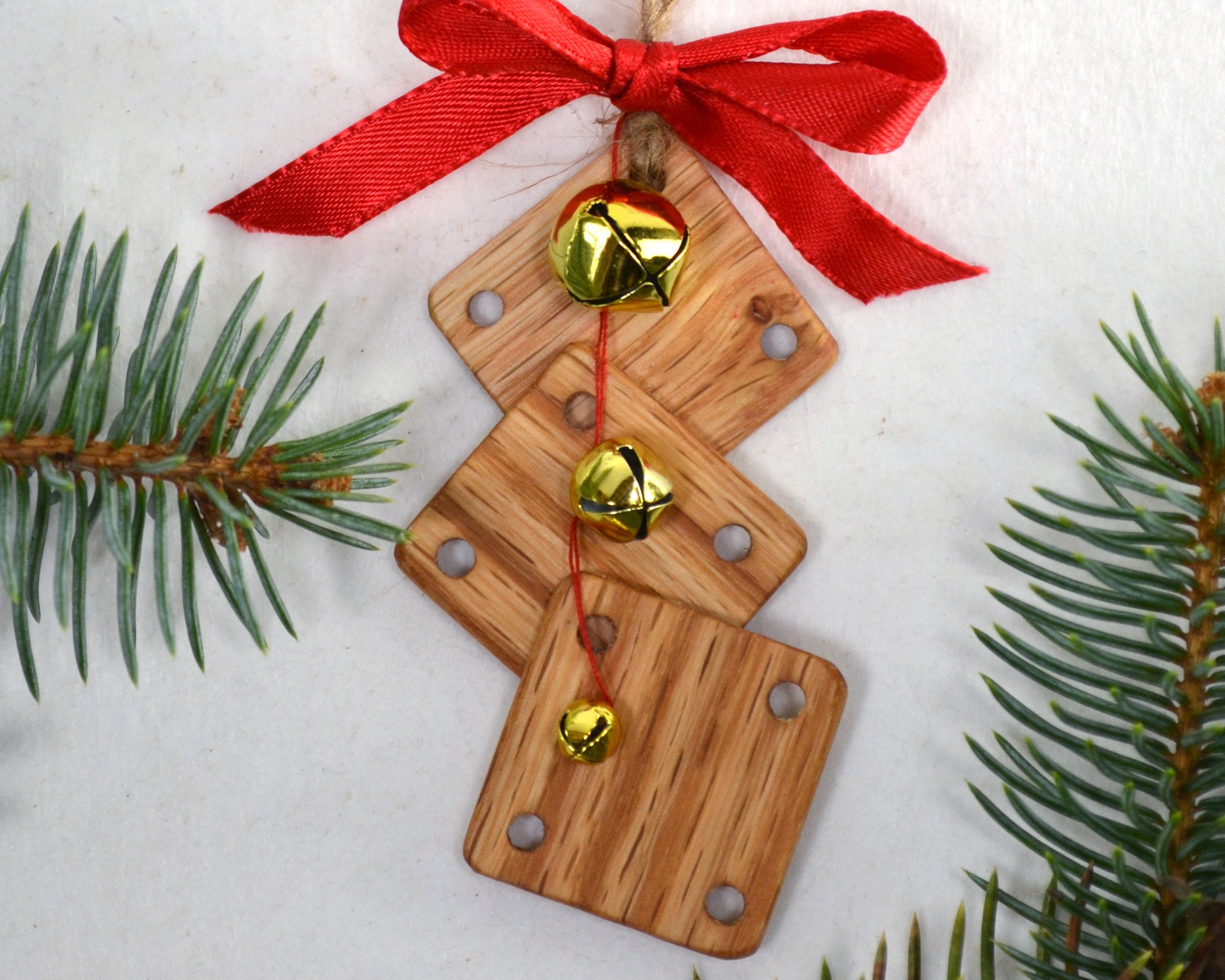 Weaving card Christmas ornament. Handcrafted from red oak by Wiener Dog Ranch.