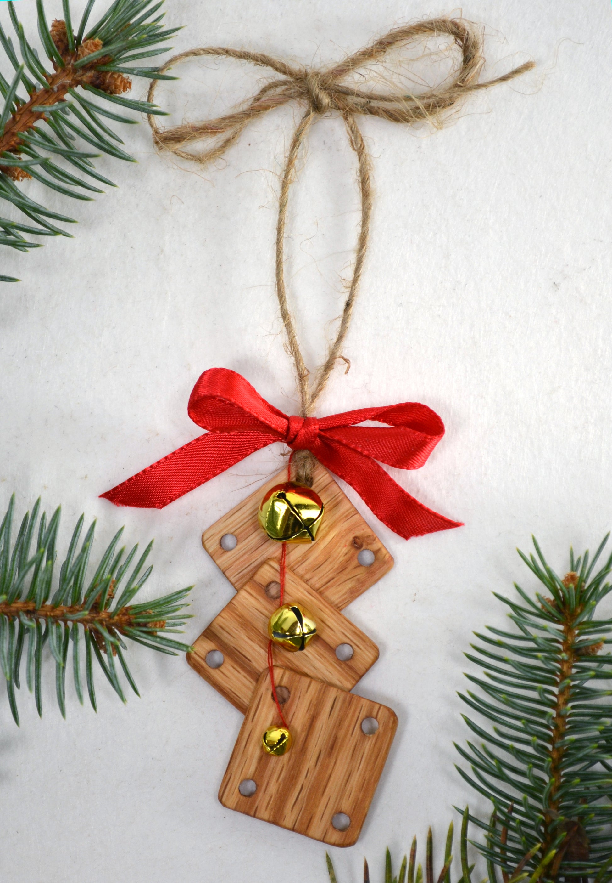 Weaving card Christmas ornament. Handcrafted from red oak by Wiener Dog Ranch. View 2.