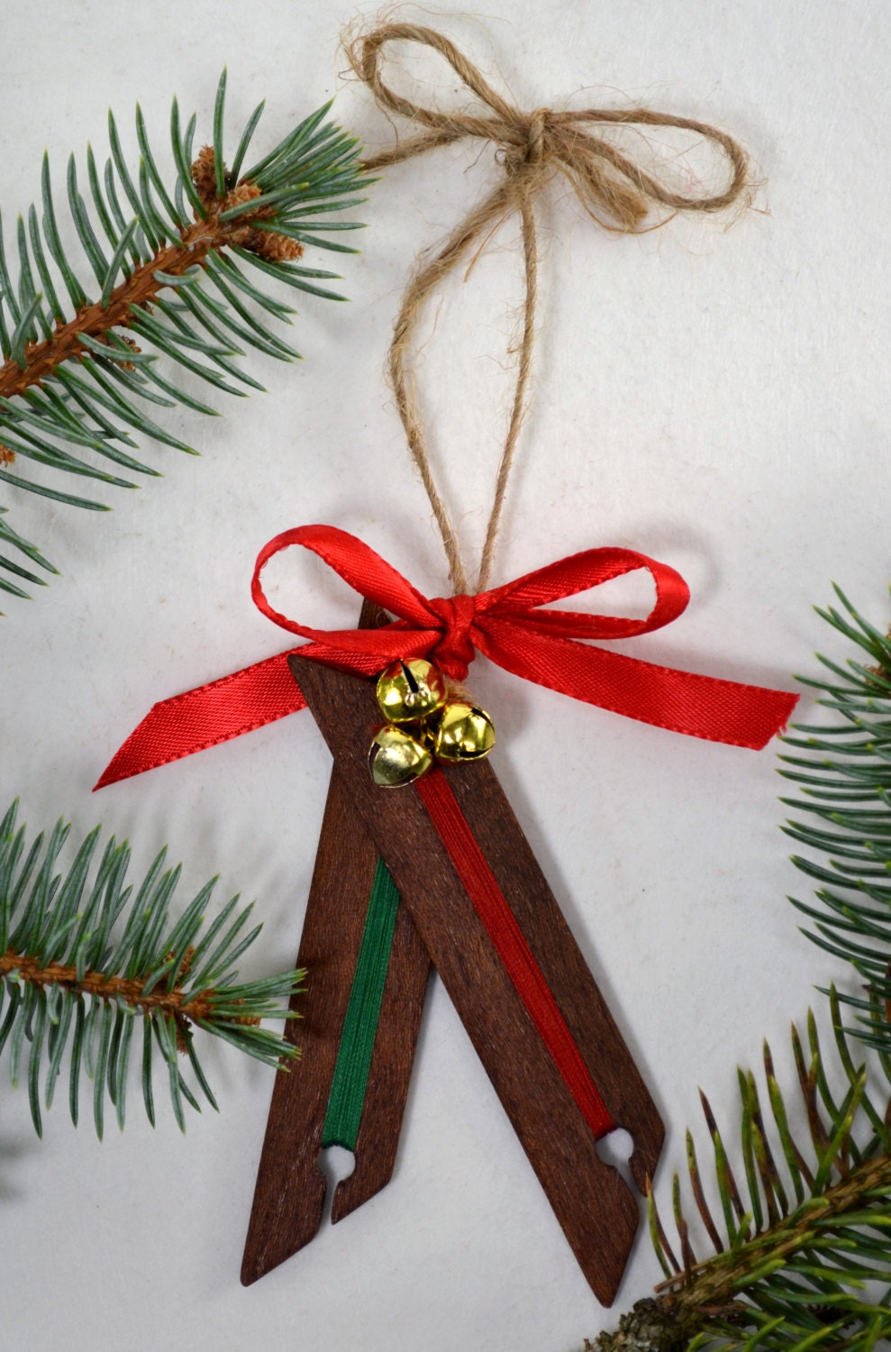 Weaving shuttle Christmas ornament. Handcrafted from mahogany by Wiener Dog Ranch. View 2.