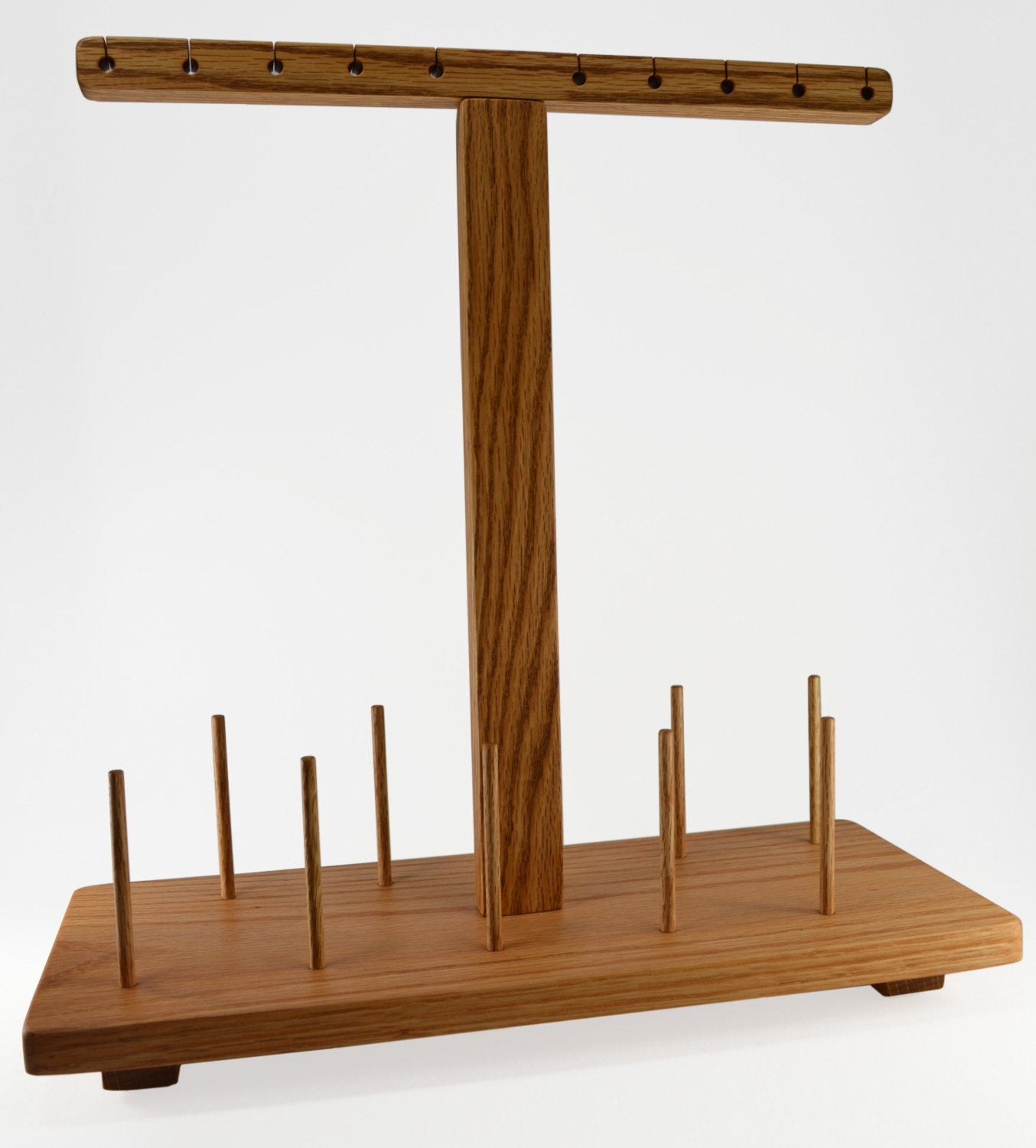 10 spool embroidery sewing machine thread stand. Handcrafted from red oak by Wiener Dog Ranch. Assembled.