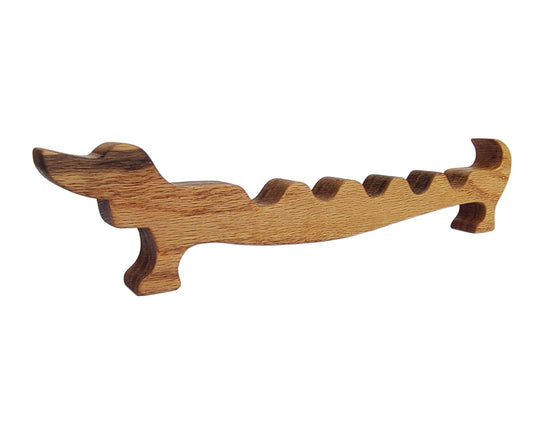 Dachshund paint brush rest or holder. Handcrafted from red oak by Wiener Dog Ranch.