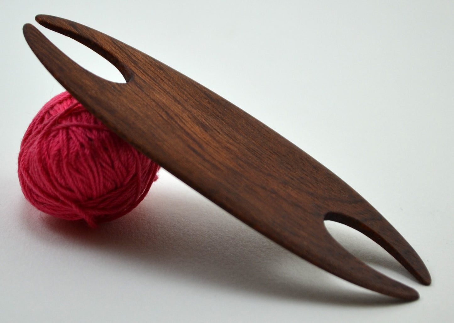 Small weaving shuttle. Handcrafted from mahogany by Wiener Dog Ranch. View 2.