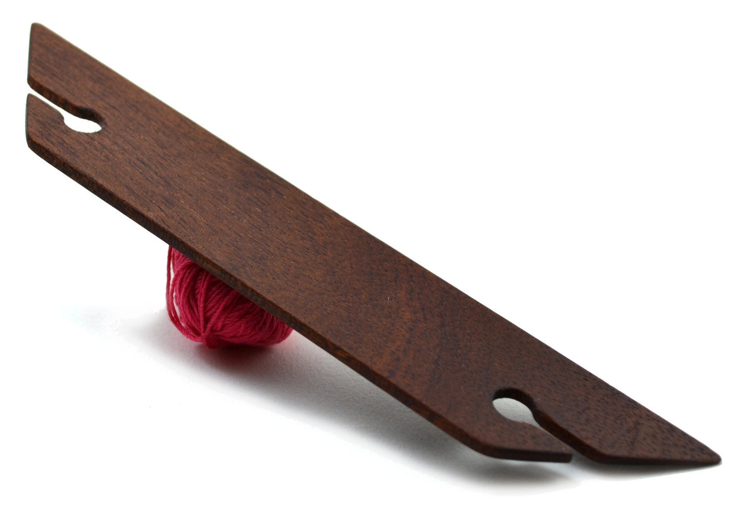 8 inch beveled weaving shuttle. Handcrafted from mahogany by Wiener Dog Ranch. Back.